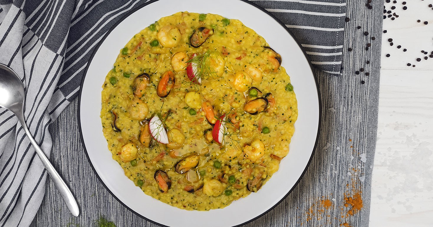 Seafood Paella (Mussels, Small Shrimps) With Turmeric, Bacon And Green Peas